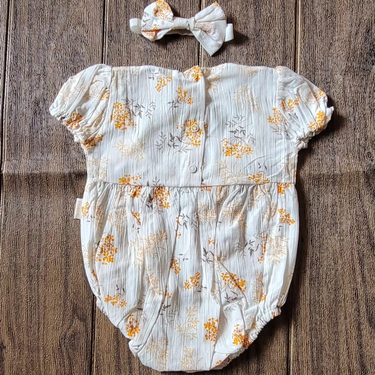 Vintage style bodysuit with head accessory
