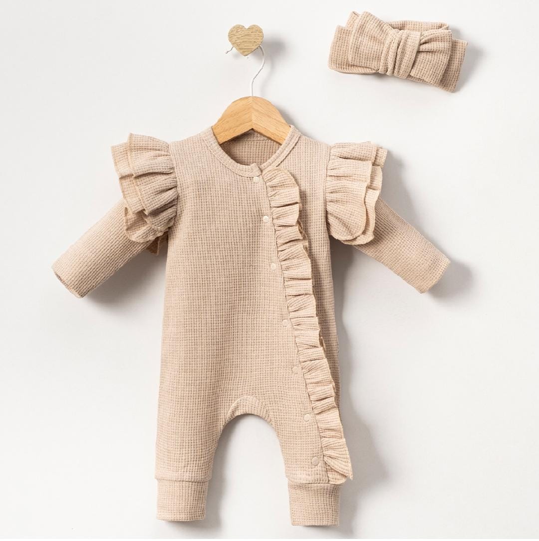 Frilled romper with headband